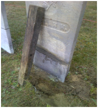 gravestone and footer ready for replacement